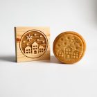 házak és hópelyhek mintájú keksz és fából készült kekszpecsét